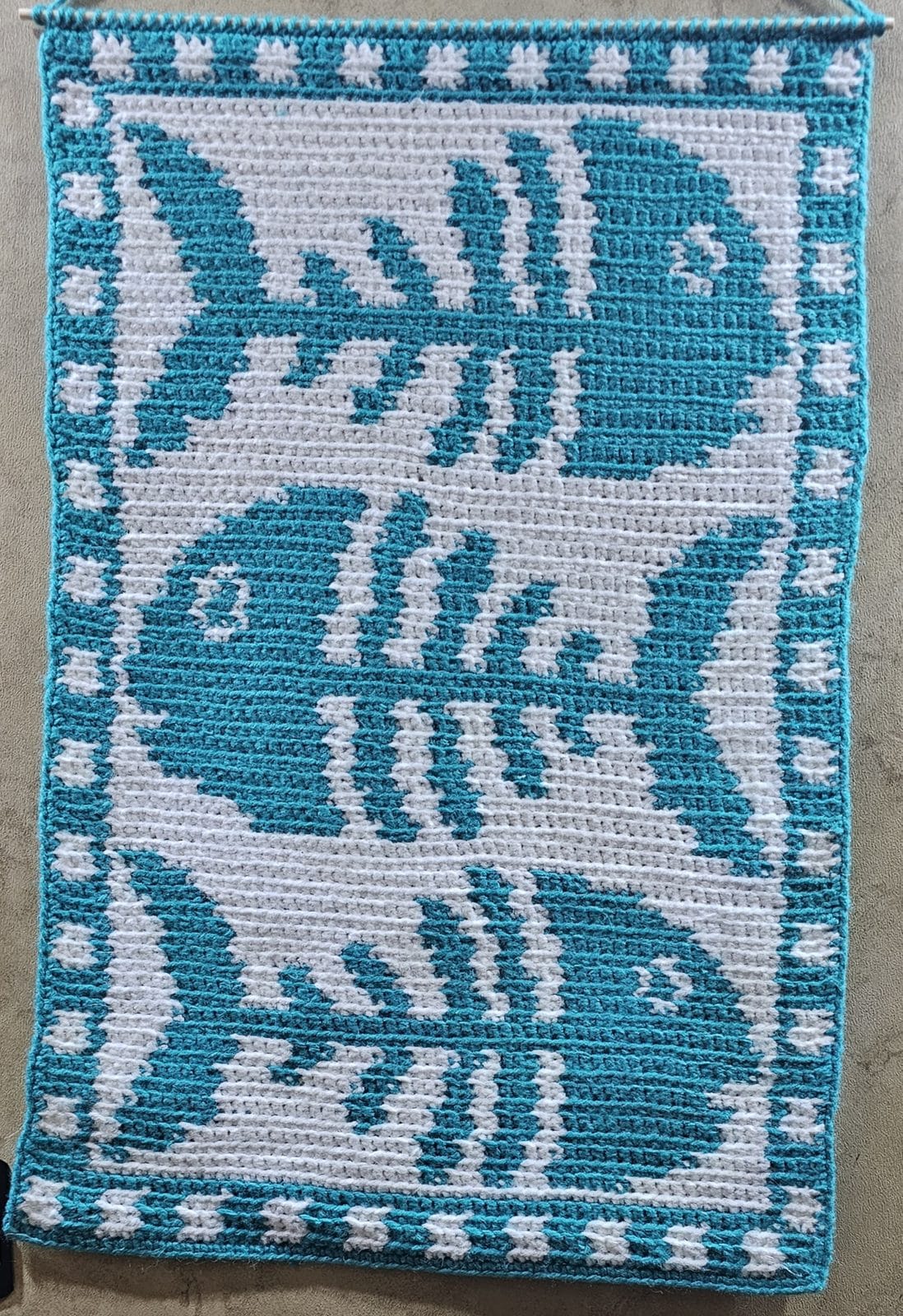 Teal fish skeleton tapestry